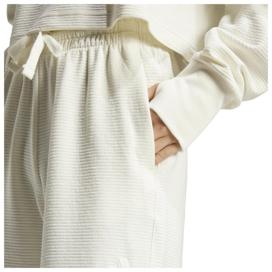 Adidas Γυναικείο παντελόνι φόρμας All SZN Rib 7/8-Length Wide-Leg Pants Adidas Γυναικείο παντελόνι φόρμας All SZN Rib 7/8-Length Wide-Leg Pants